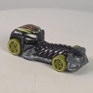 Hot Wheels 2009 Skull Crusher Diecast Car Black & Green Bone Design Made In Mala